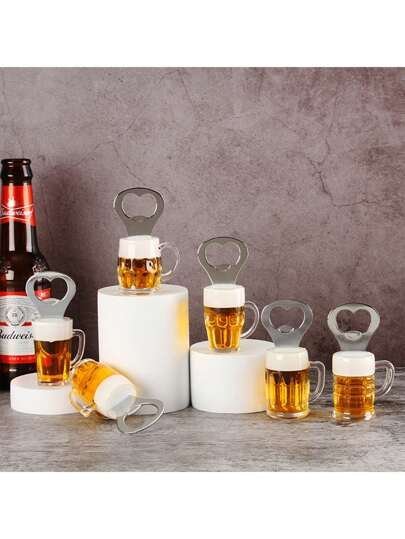 Row of beer mugs with foamy tops on white blocks, with heart-shaped bottle openers on top, and a Budweiser bottle on the left against a gray backdrop.